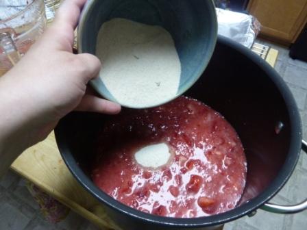 Adding in the pectin/1/4 cup sugar mixture before cooking.